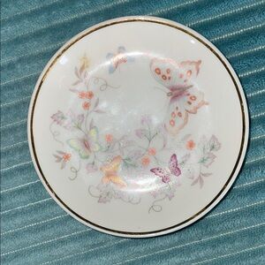 Avon 4” porcelain trinket plate w/floral and butterfly design